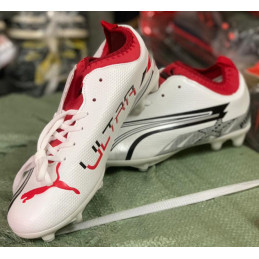 Chaussures de football Puma...